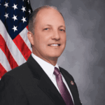 Port Richey Mayoral Race: Incumbent John Hoover Faces Challenge from Linda Rodriguez