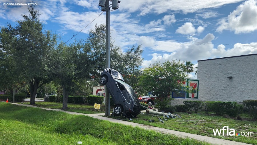 Driver Arrested After Car Lands on Its Back Wheels in Holiday Crash