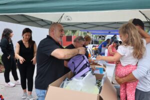 Slice of the Hillz Hosts 1st Annual Back-to-School Bash, Distributes 200 Backpacks to Zephyrhills Students
